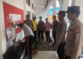 Polres Kuansing Jaga Pengamanan Pengumuman Daftar Calon Tetap calon Anggota DPRD Kuansing tahun 2024