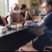 KPU Provinsi Riau Kerjasama Dengan Dinkes Riau Periksa Tensi Darah Kasi Humas Polresta Pekanbaru Ikut serta