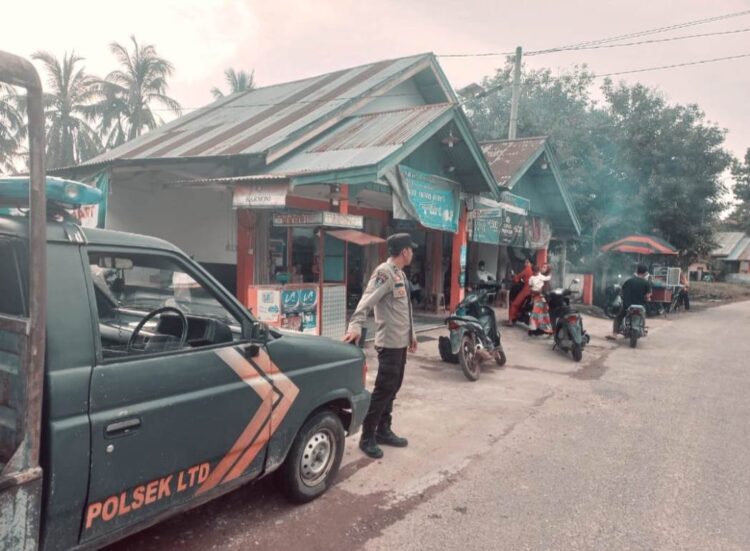 Polsek Logas Tanah Darat dan Polsek Benai Lakukan Pengamanan Pasar Ramadhan dan Pasar Kaget